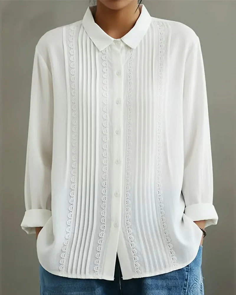 Selina | Elegante blusa plissettata con pizzo raffinato
