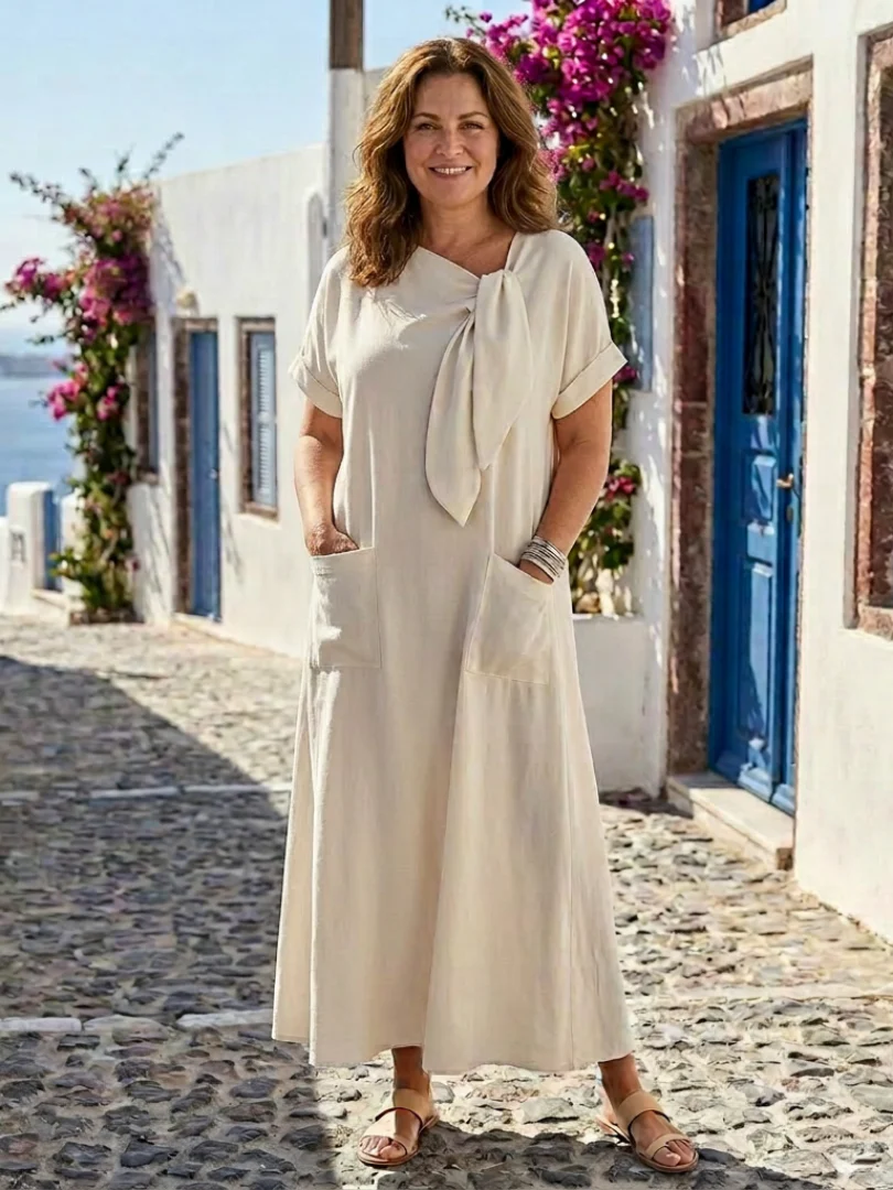 Valentina | Maxi abito fluido con tasche e dettaglio a fiocco